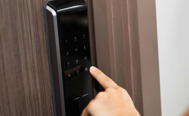 Smart lock keypad on modern door